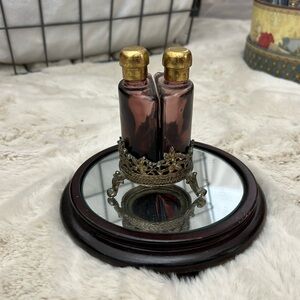 1930 Purple apothecary perfume bottle with brass tops and setting